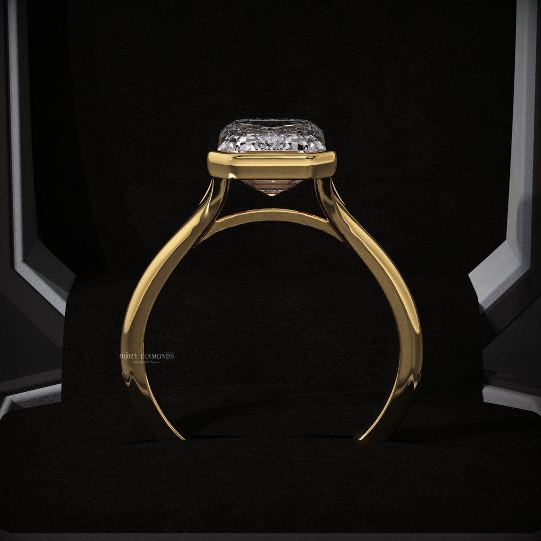 Emerald bezel lab grown diamond ring fitted on finger