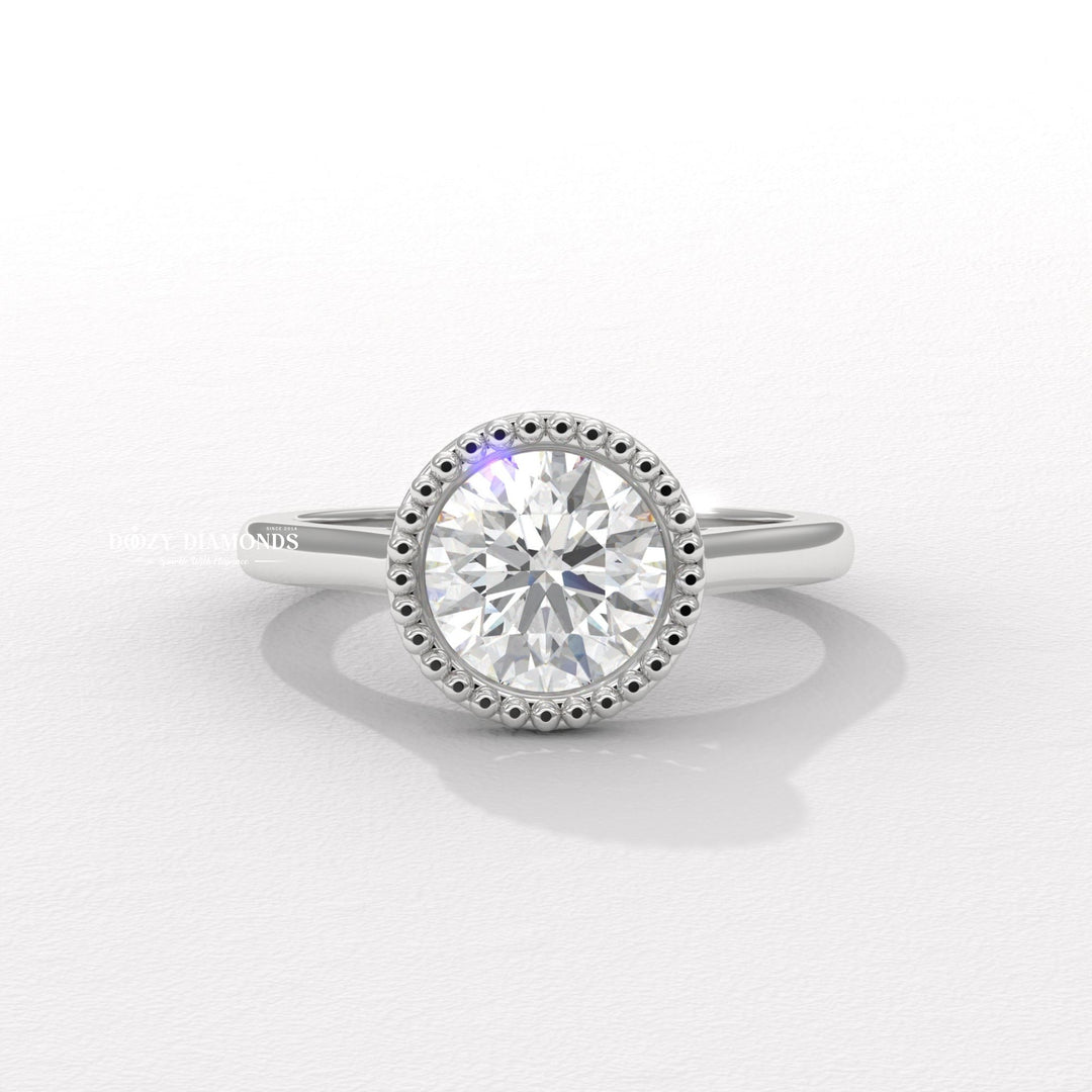 Side angle of round bezel diamond engagement ring