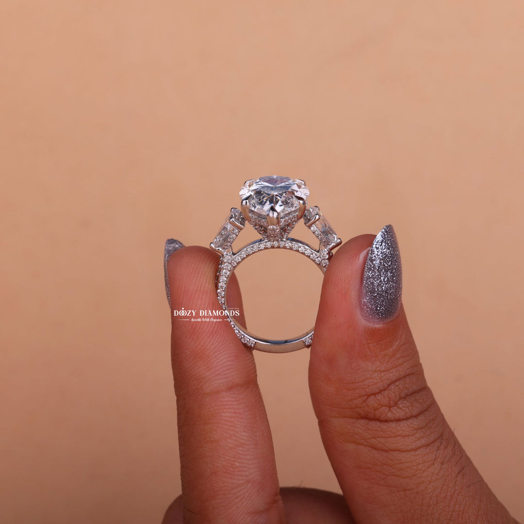 Pear three stone engagement ring with IGI certificate and packaging