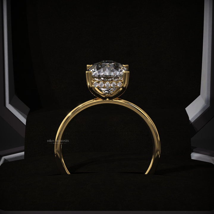 Cushion hidden halo diamond ring presented in signature gift packaging