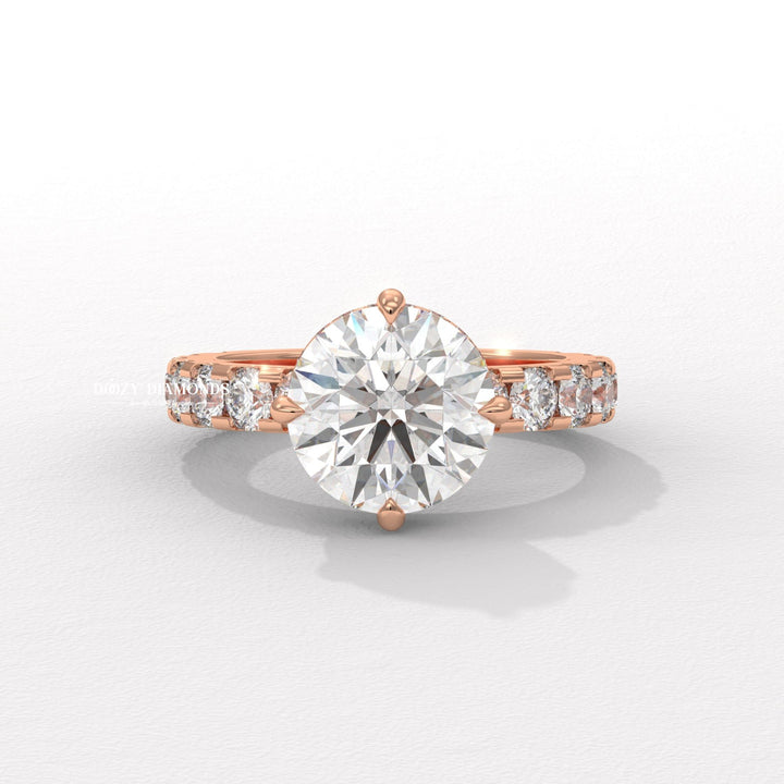 Lifestyle shot of round hidden halo diamond ring on hand