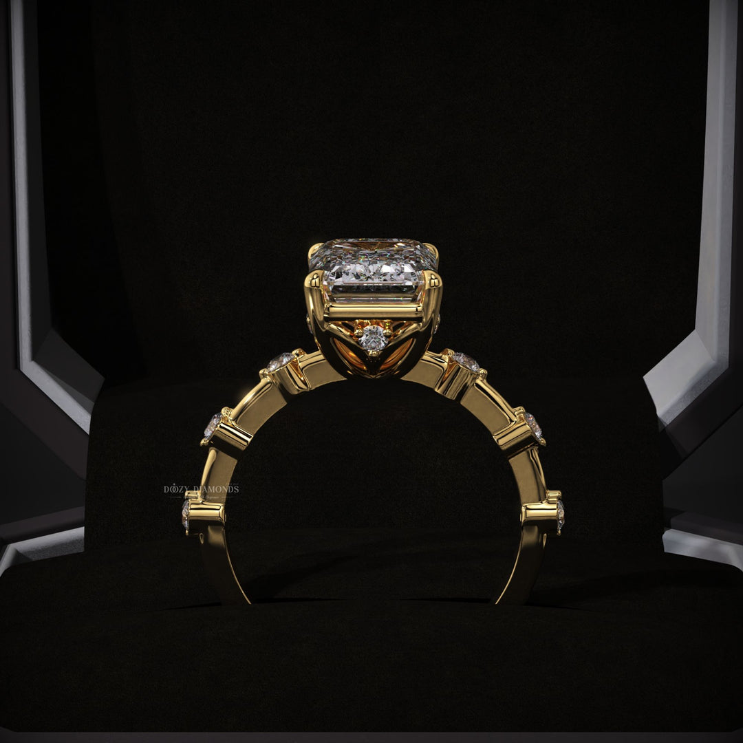 Detailed close-up of emerald pave diamond engagement ring