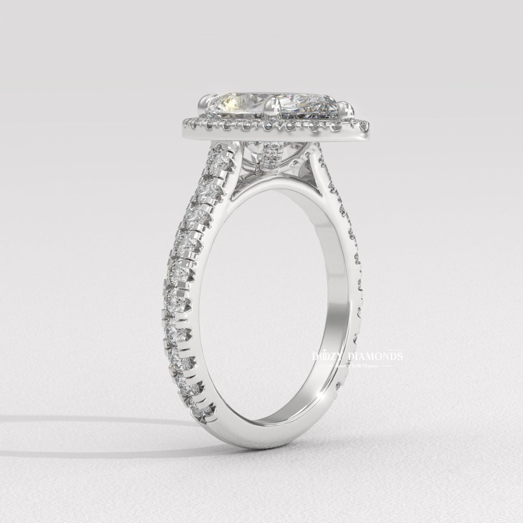 Shop the pear cut halo engagement ring collection online