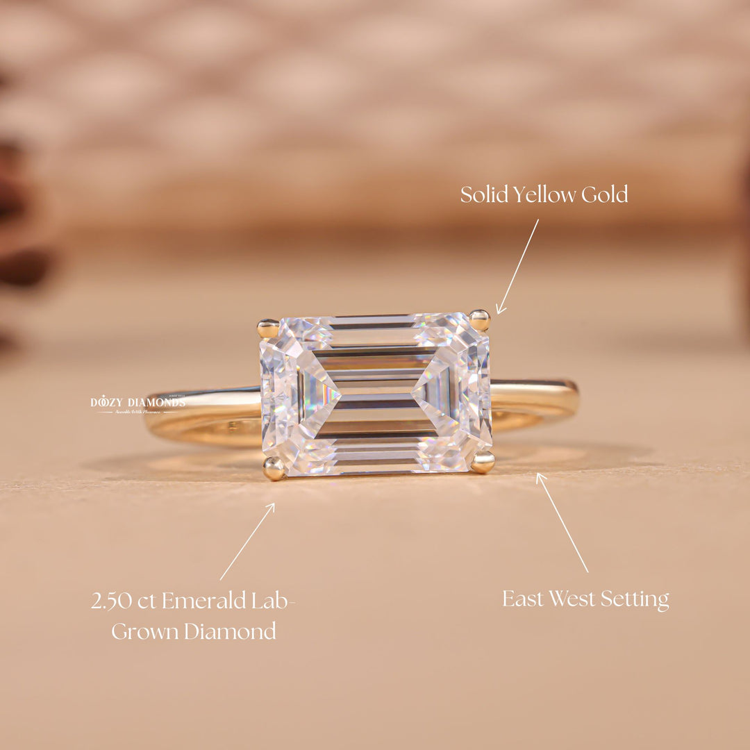 Emerald east west engagement ring viewed from the side