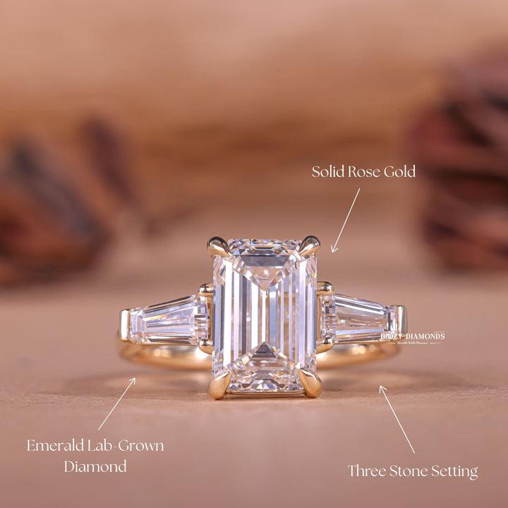 IGI certified emerald cut diamond in three stone engagement ring setting