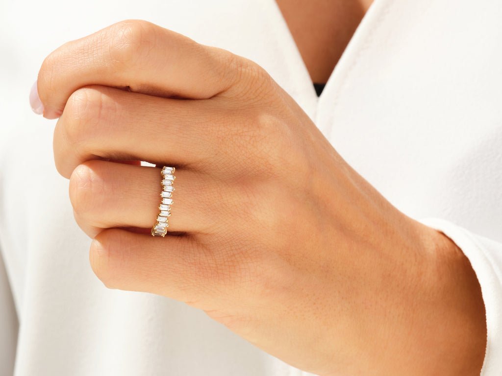 Round lab grown diamond band worn on hand