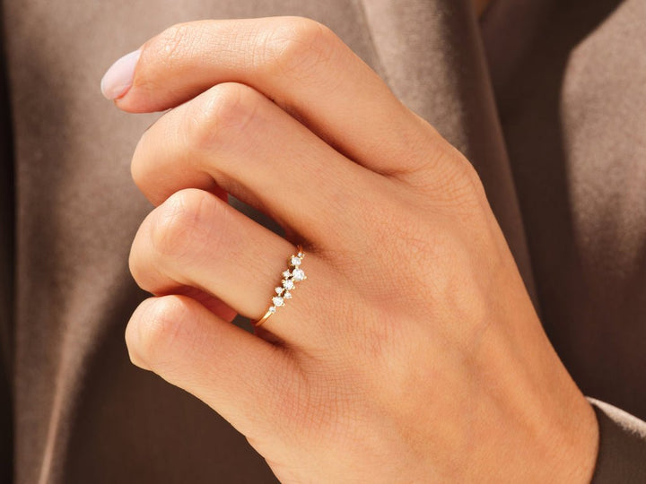 Round diamond wedding band in rose gold
