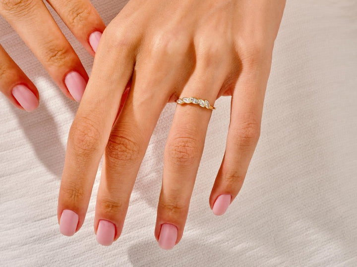 Marquise lab grown diamond band worn on hand
