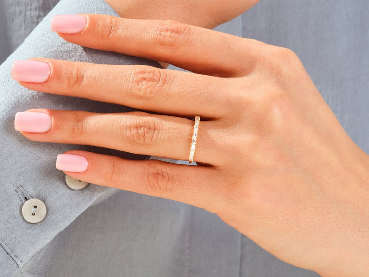 Baguette diamond wedding band in rose gold
