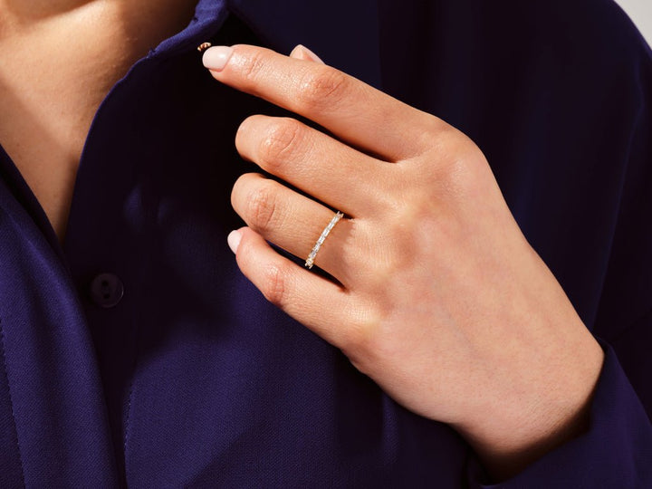 Baguette diamond wedding band in yellow gold
