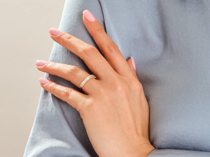 Baguette diamond band stacked with engagement ring