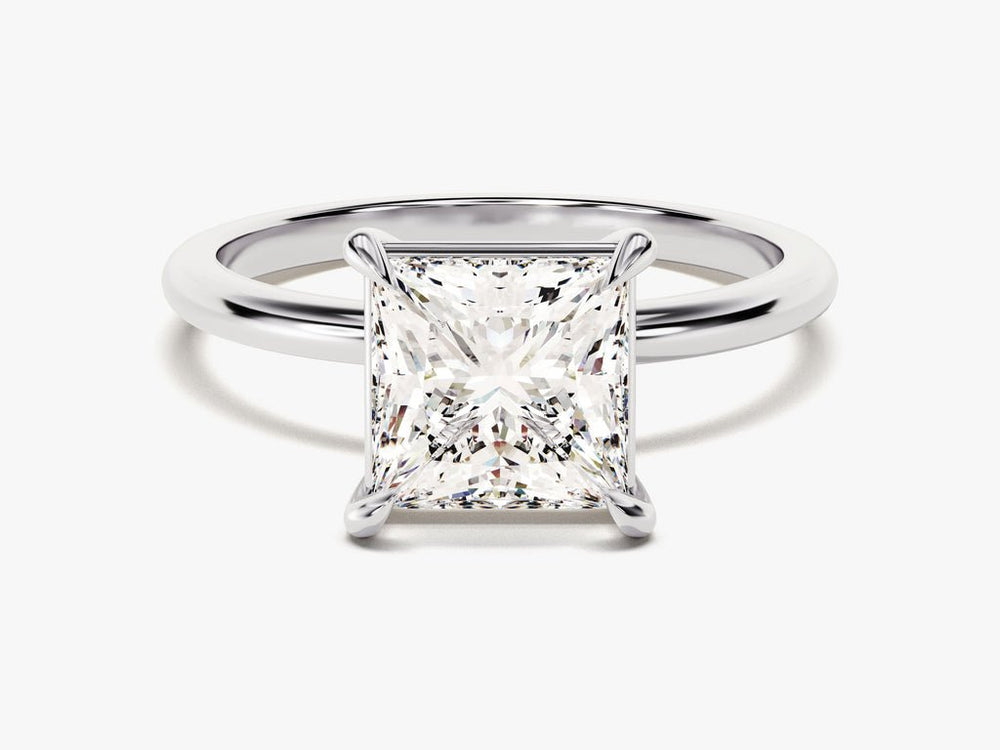 Detailed close-up of princess solitaire diamond engagement ring