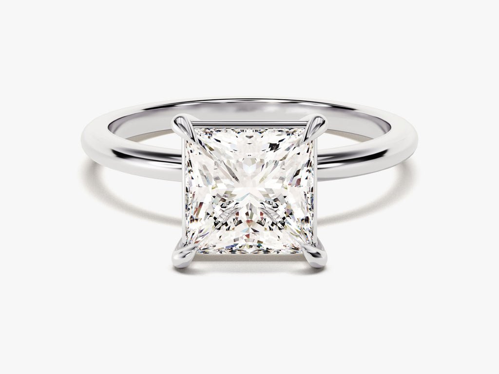 Detailed close-up of princess solitaire diamond engagement ring