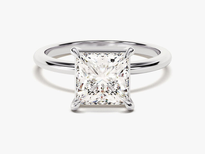 Detailed close-up of princess solitaire diamond engagement ring