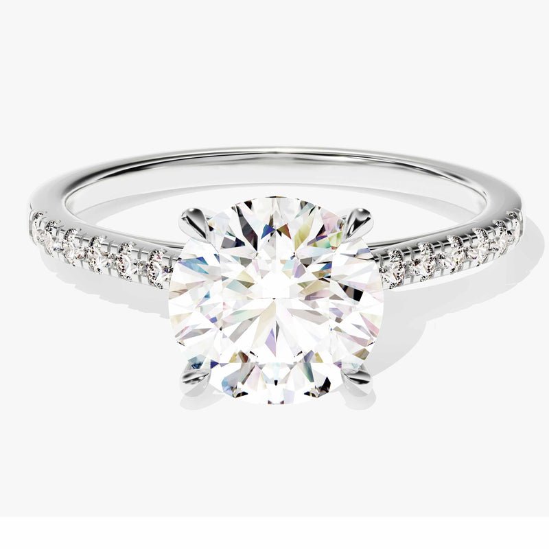 Fine craftsmanship detail on round pave engagement ring