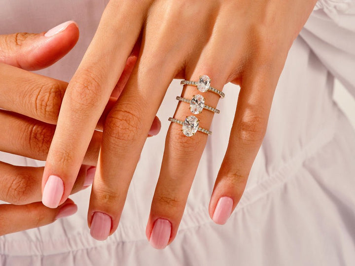 Side angle of oval pave diamond engagement ring