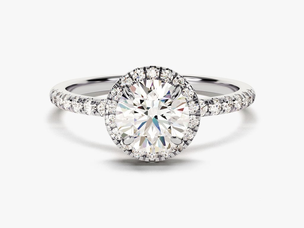 Round cut diamond ring worn on hand