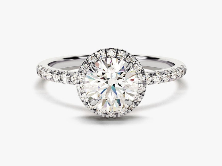 Round cut diamond ring worn on hand