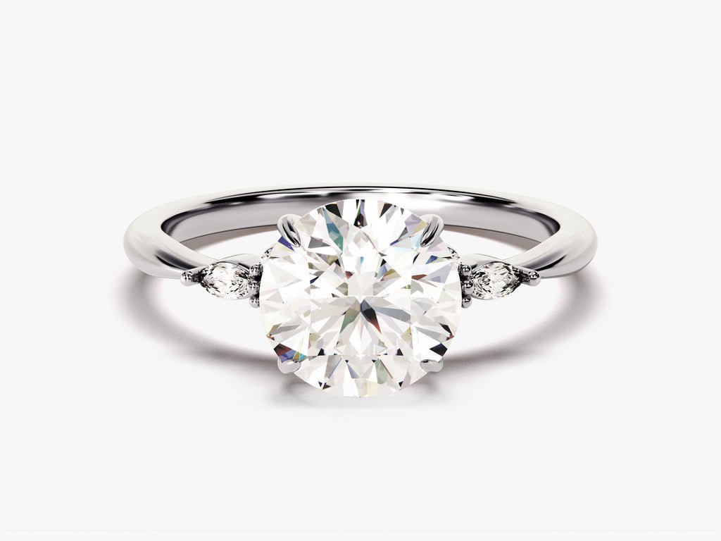 Round cut diamond ring worn on hand