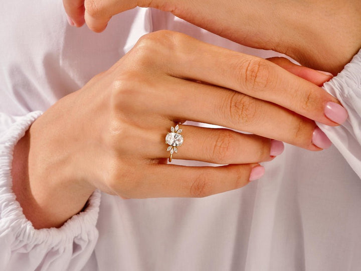 Side angle of oval cluster diamond engagement ring