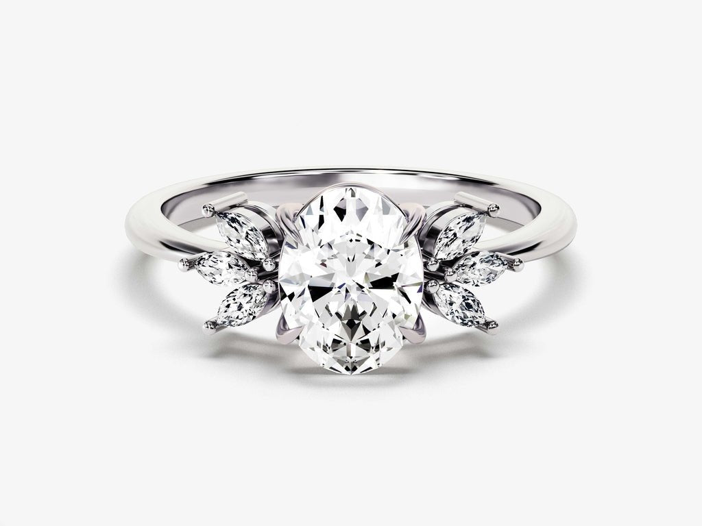 Macro shot of oval cut diamond facets in cluster ring setting
