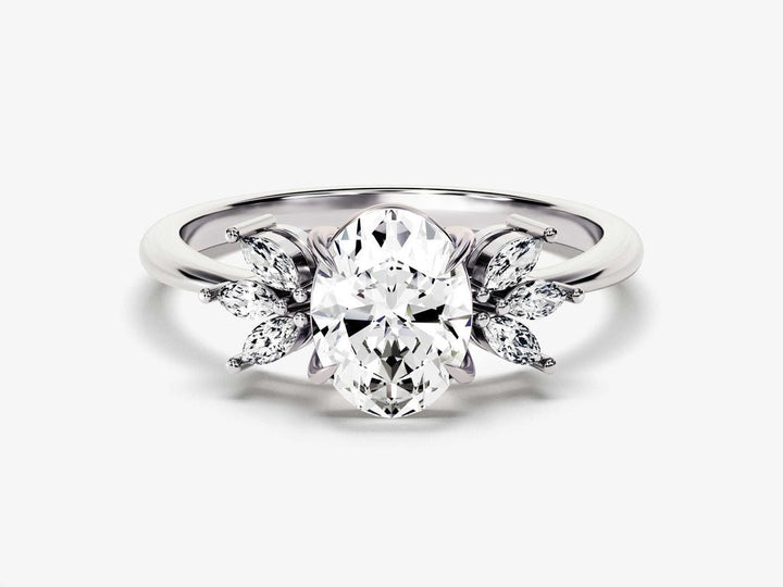 Macro shot of oval cut diamond facets in cluster ring setting