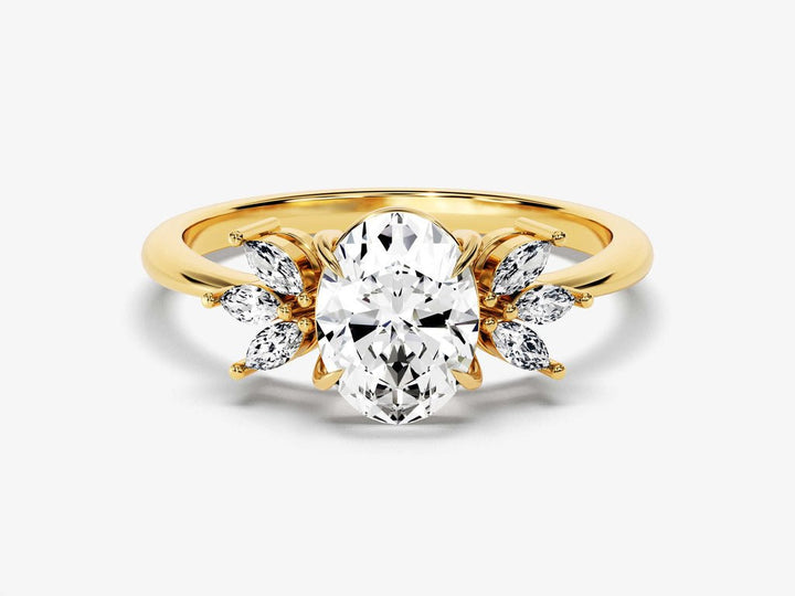 Close-up of oval cut center diamond in cluster engagement ring