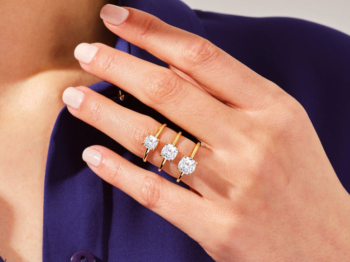 Cushion solitaire engagement ring viewed from the side