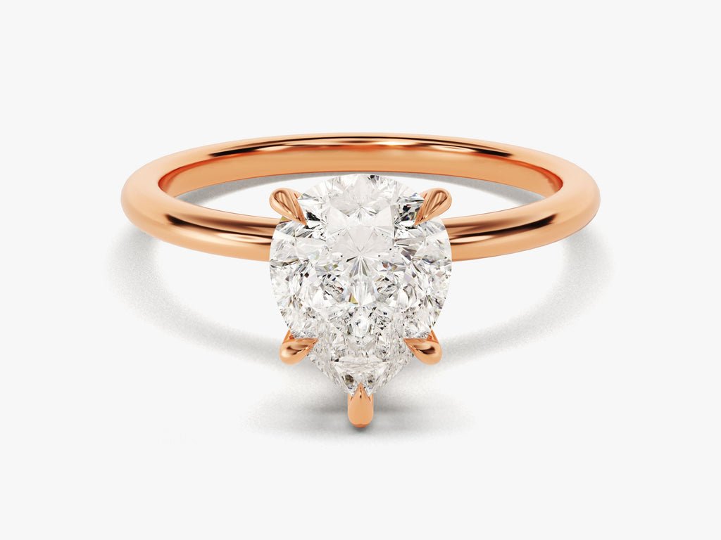 Macro shot of pear cut diamond facets in solitaire ring setting