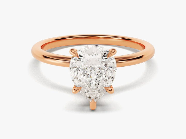 Macro shot of pear cut diamond facets in solitaire ring setting