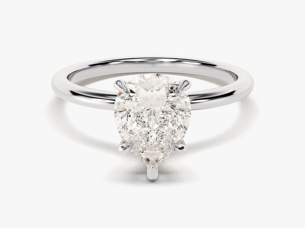 Close-up of pear cut center diamond in solitaire engagement ring
