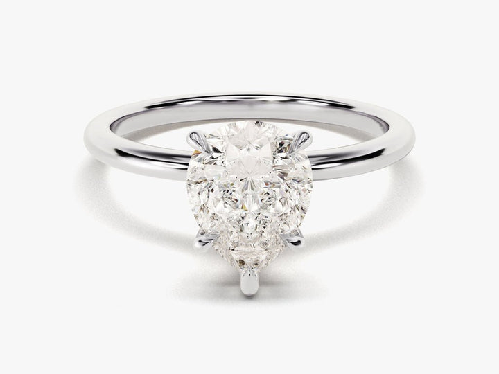 Close-up of pear cut center diamond in solitaire engagement ring