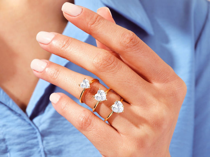 Heart solitaire engagement ring with IGI certificate and packaging
