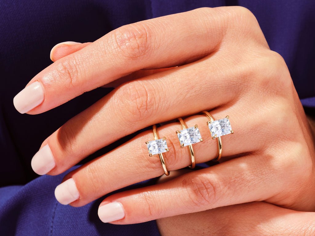 Radiant cut solitaire engagement ring shown in real-life wear