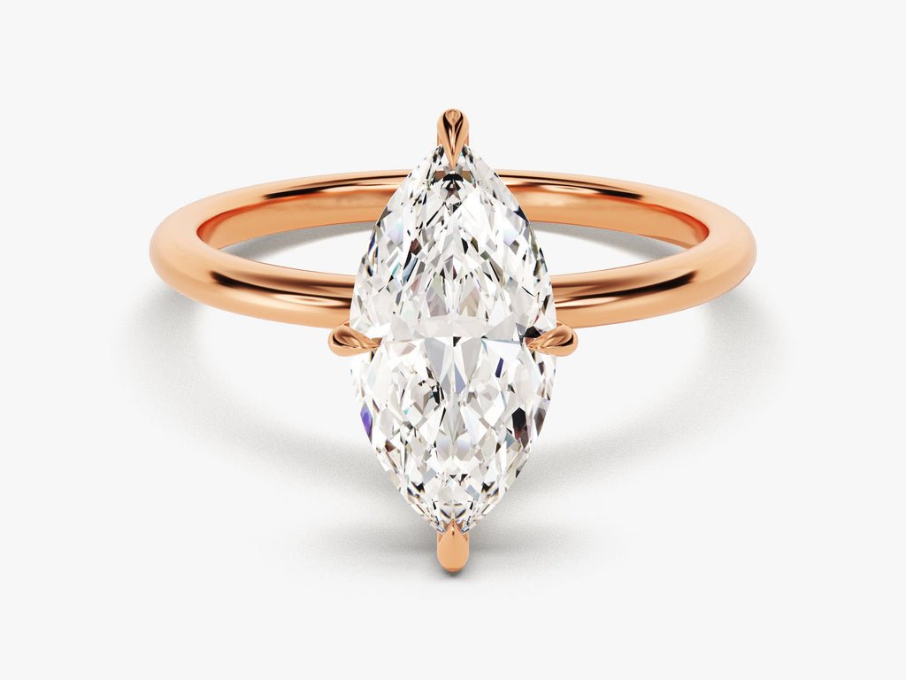 Marquise solitaire lab grown diamond ring side profile in gold setting