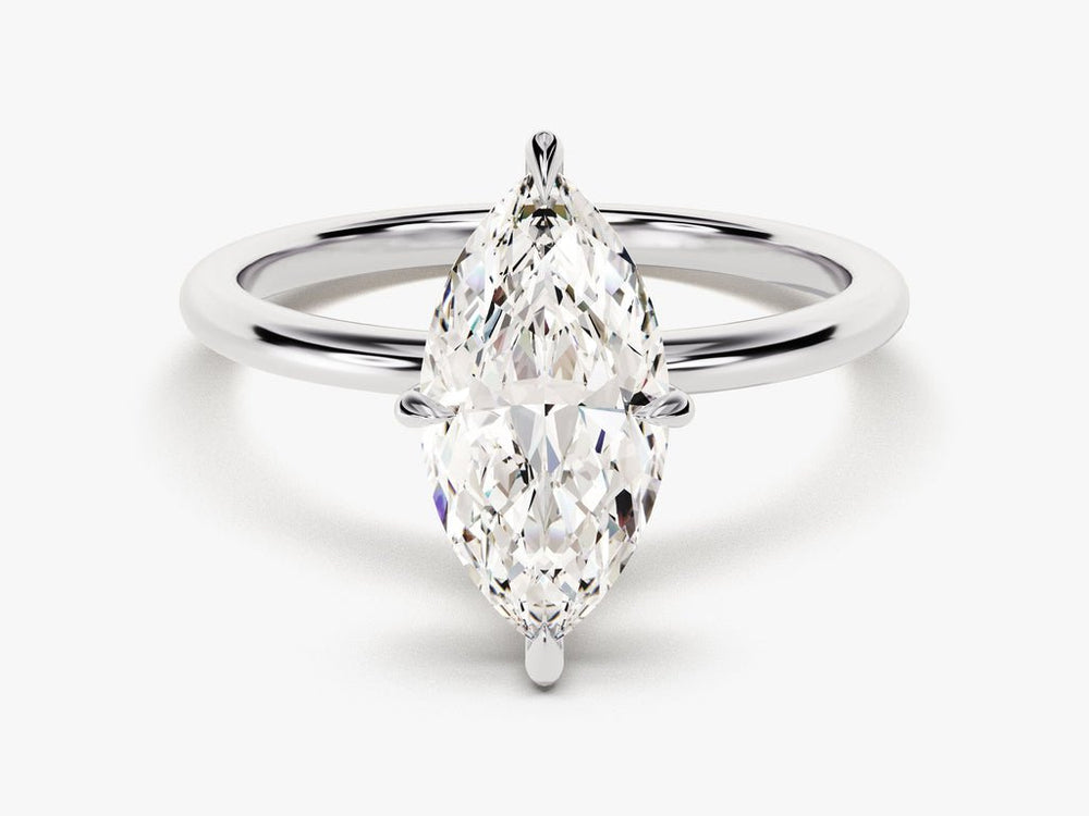 Detailed close-up of marquise solitaire diamond engagement ring