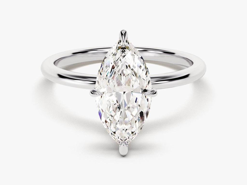 Detailed close-up of marquise solitaire diamond engagement ring