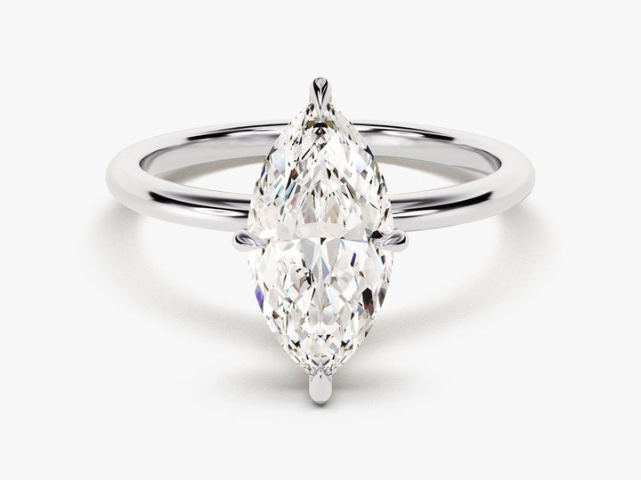 Detailed close-up of marquise solitaire diamond engagement ring