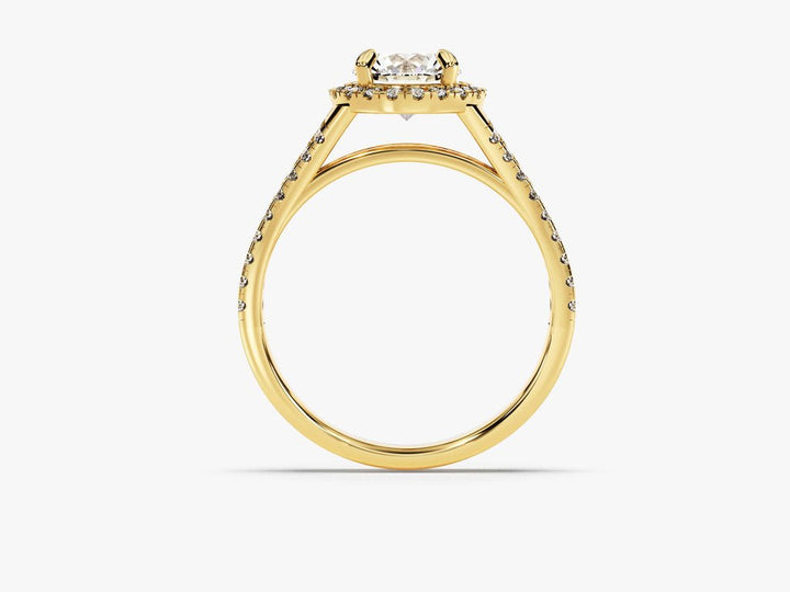 Round solitaire engagement ring finished in polished solid gold