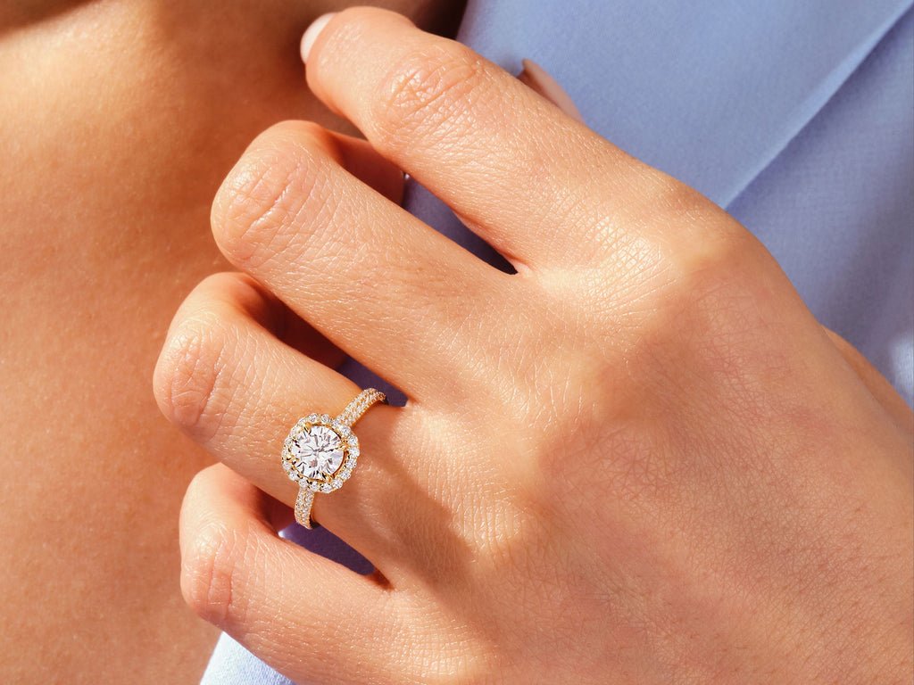 Round pave engagement ring close-up showing high clarity diamond clarity