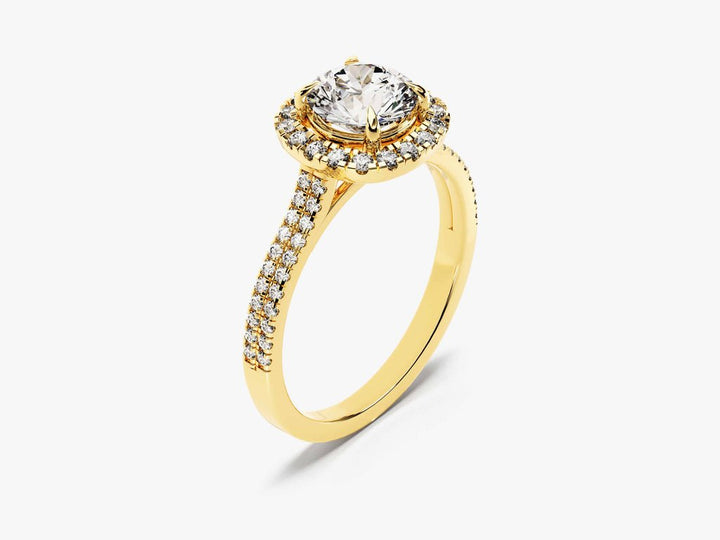 Close-up of round cut center diamond in pave engagement ring