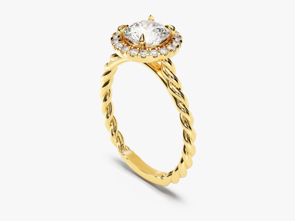 Round halo engagement ring offered in gold and platinum