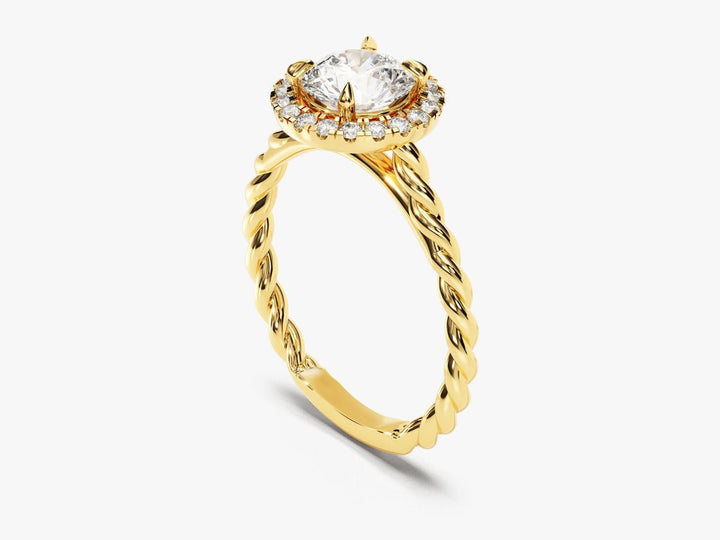 Round halo engagement ring offered in gold and platinum