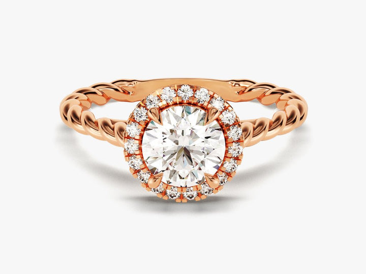 Round halo diamond ring presented in signature gift packaging