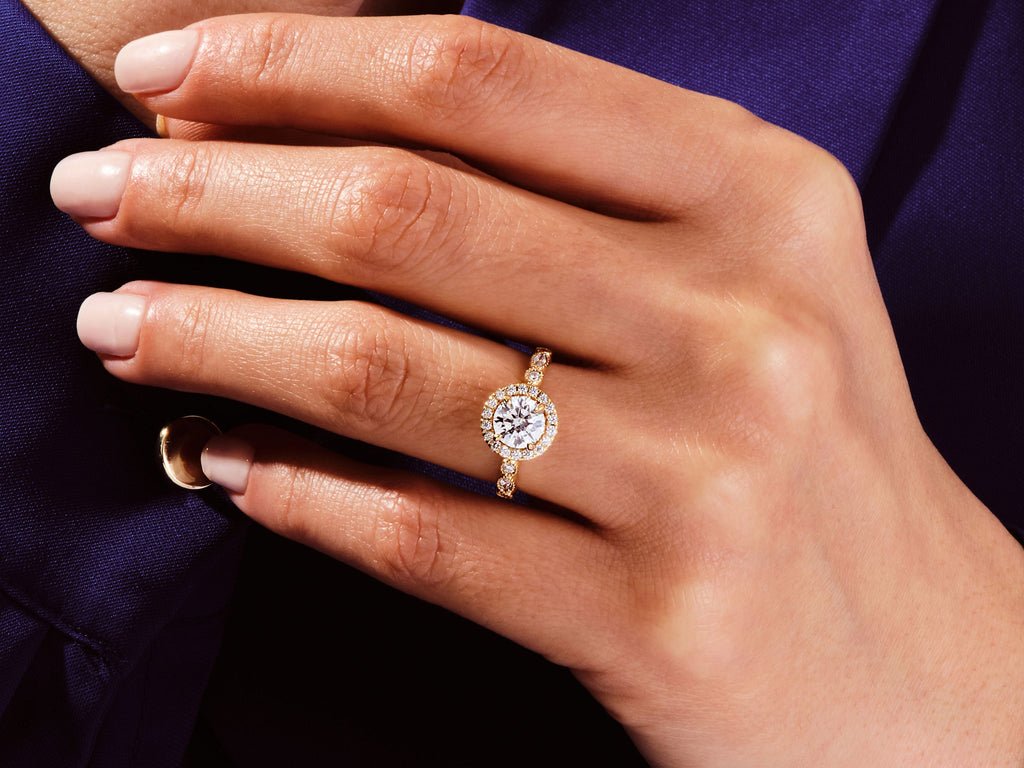 Round halo lab grown diamond ring side profile in gold setting
