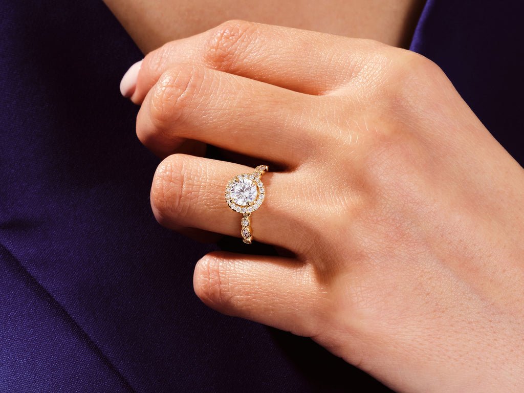 Round cut engagement ring side view showing band detail