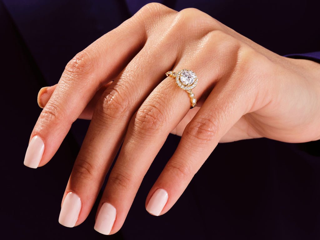 Side angle of round halo diamond engagement ring