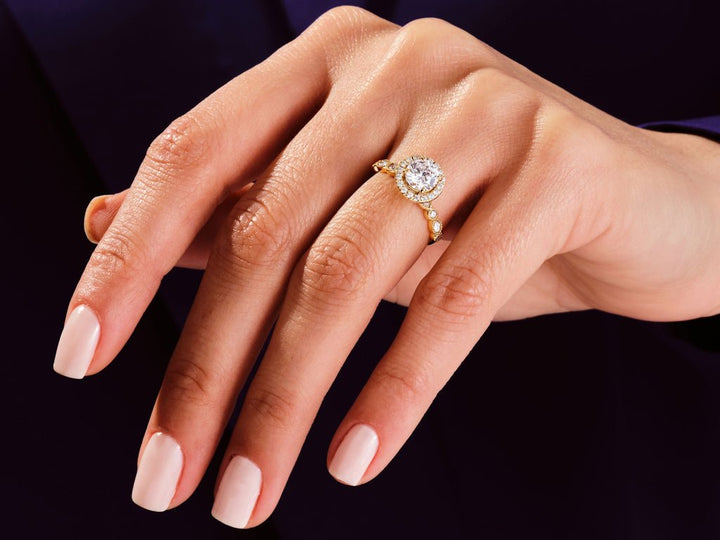 Side angle of round halo diamond engagement ring