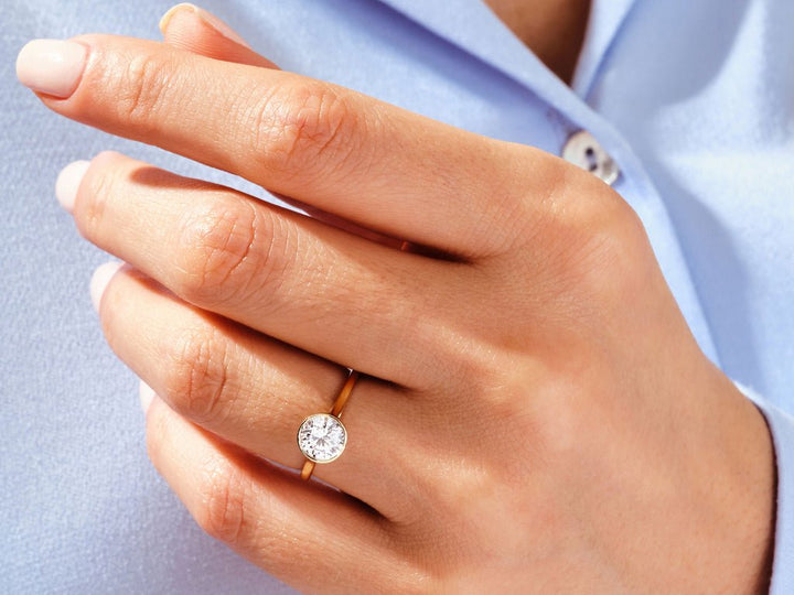 Buy round cut bezel diamond engagement ring with free shipping