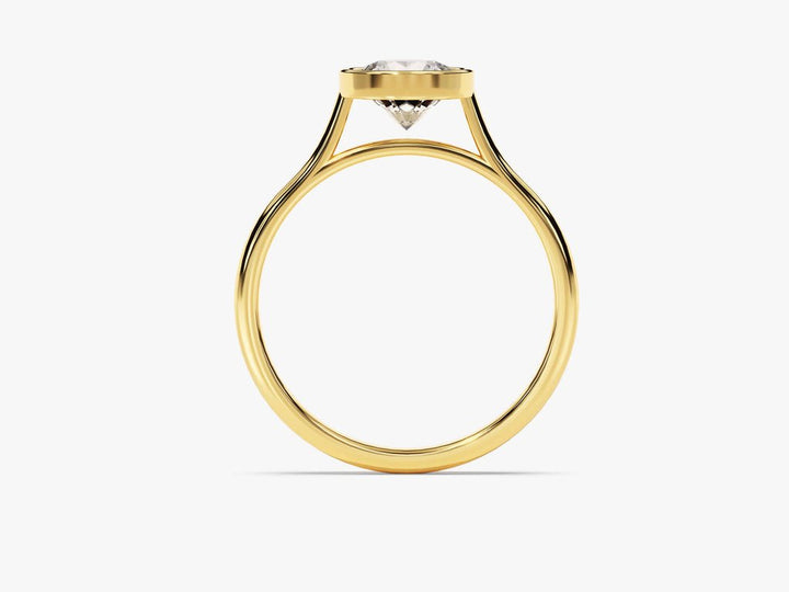 Round bezel ring set with an IGI graded diamond
